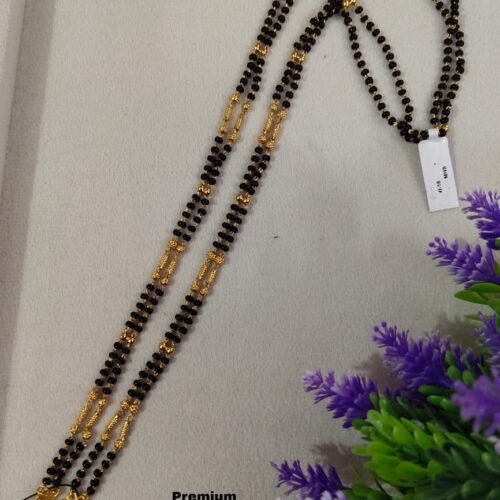 One Gram gold long black beads with out locket... 26 inches