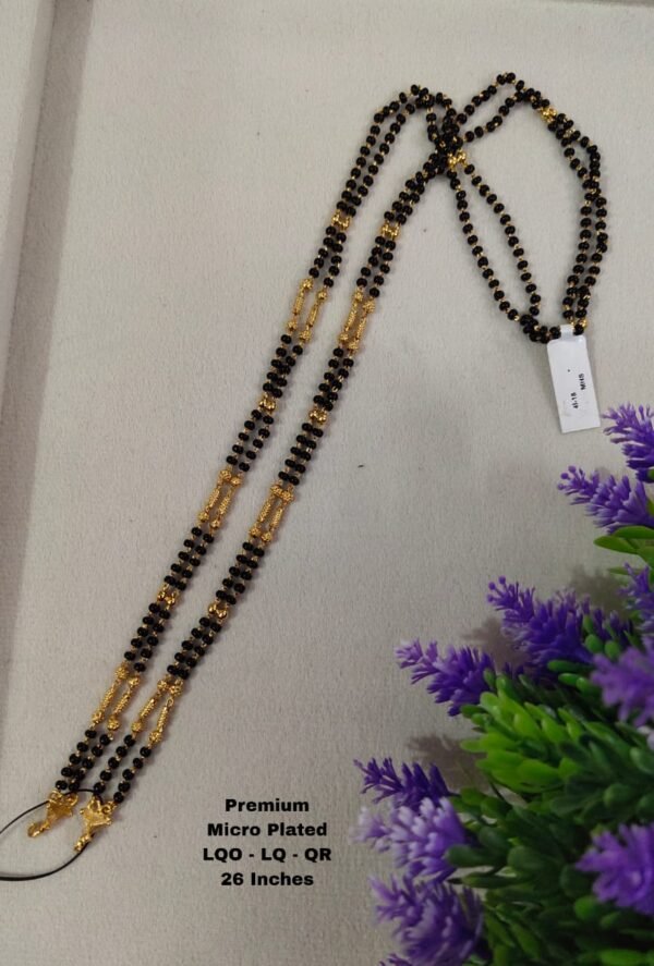 One Gram gold long black beads with out locket... 26 inches