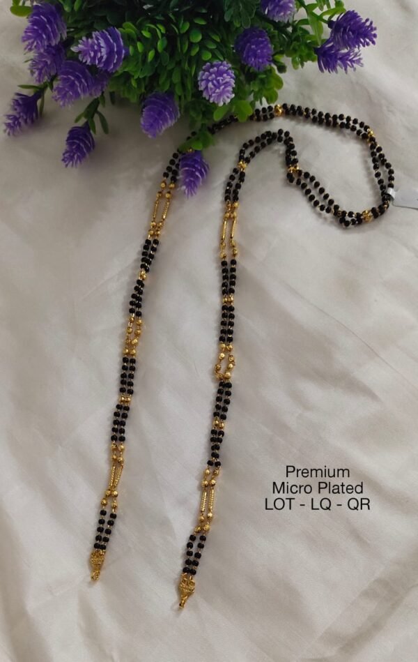 One Gram gold long black beads with out locket... 26 inches