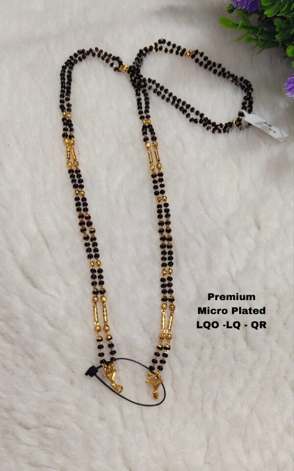 One Gram gold long black beads with out locket... 26 inches
